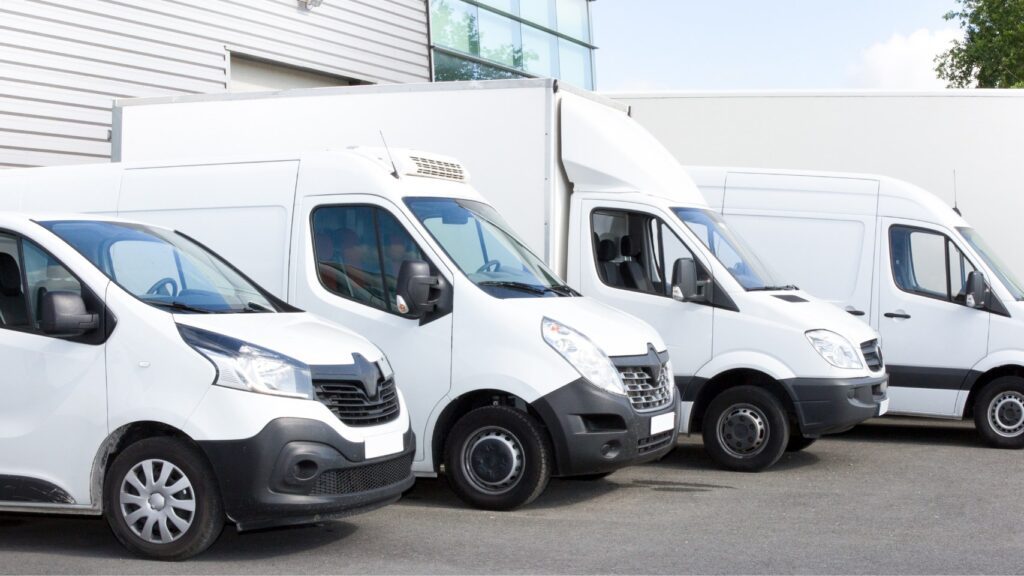 Various sizes of vans parked