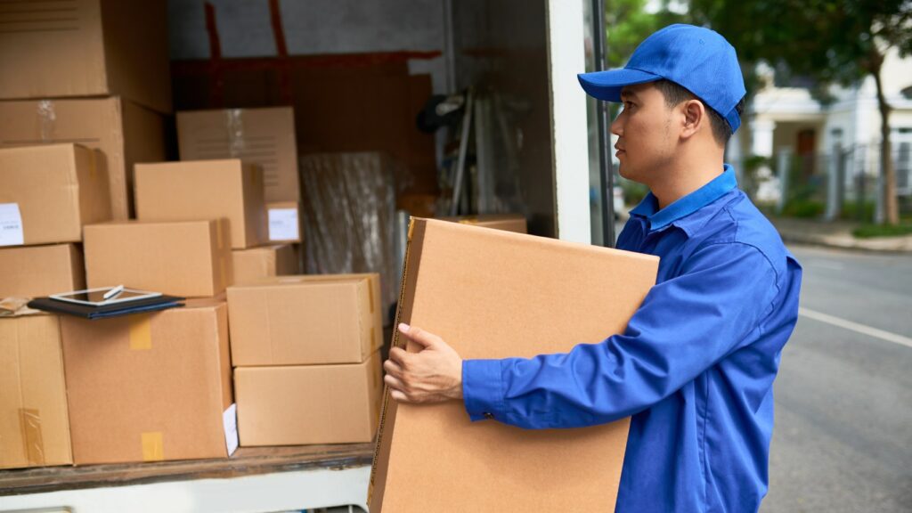 Boxes are being loaded into a van